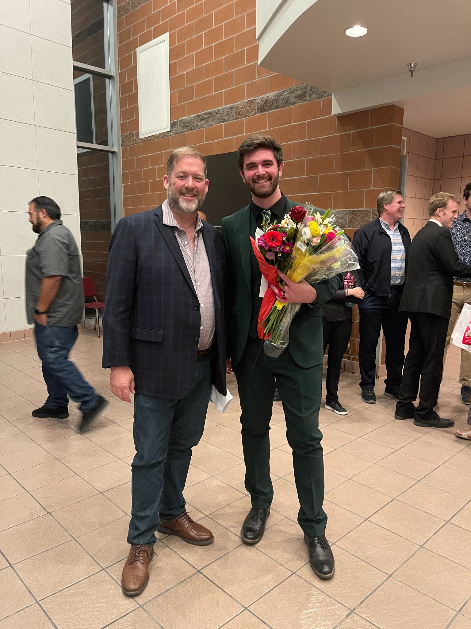 Andrew Stuckey with a student